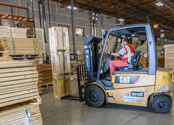 custom-crates-being-loaded-onto-forklift